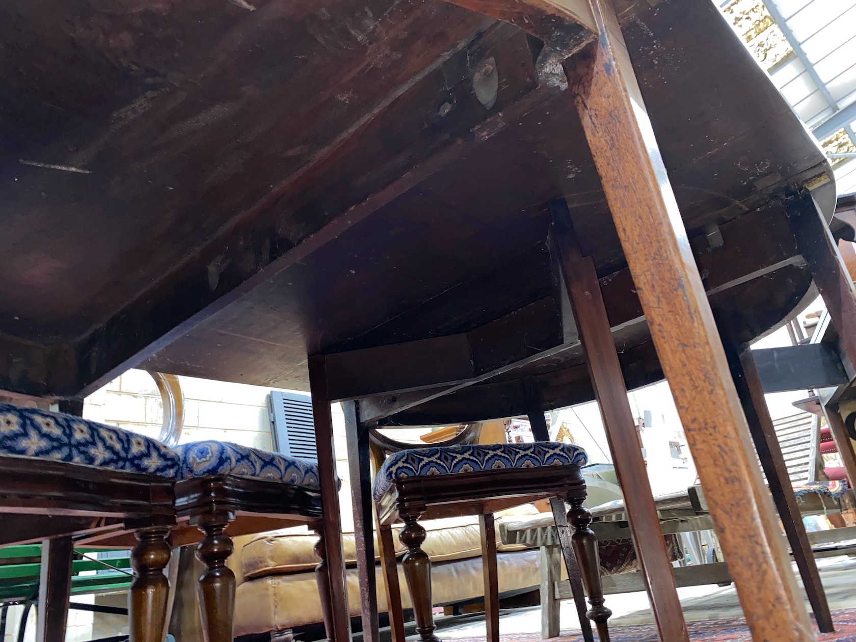 A George III mahogany D end extending dining table with later drop leaf, 180cm extended, depth 127cm, height 74cm